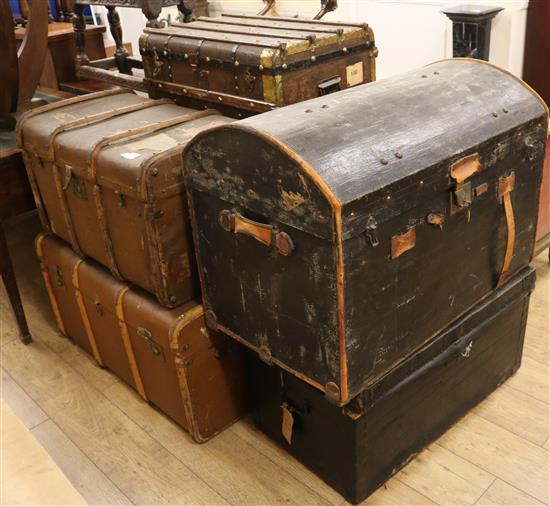 Seven assorted travelling trunks